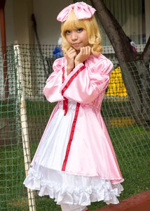 Rating: Safe Score: 0 Tags: 1girl blonde_hair bow brick_wall chain-link_fence dress drill_hair fence fishnet_legwear fishnets frills hair_bow hinaichigo honeycomb_(pattern) looking_at_viewer outdoors photo photorealistic pink_bow pink_dress pink_ribbon smile solo standing tiles User: admin