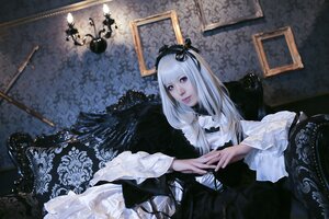 Rating: Safe Score: 0 Tags: 1girl bangs dress frills gothic_lolita indoors lace lolita_fashion long_hair long_sleeves realistic ribbon sitting solo suigintou white_hair wings User: admin