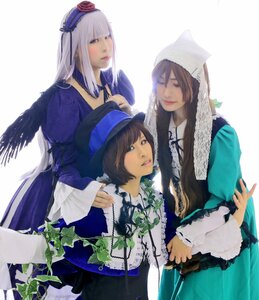 Rating: Safe Score: 0 Tags: 3girls blue_dress brown_hair dress feathers frills hat head_scarf lips long_hair long_sleeves multiple_cosplay multiple_girls silver_hair sisters souseiseki suigintou suiseiseki tagme top_hat wings User: admin