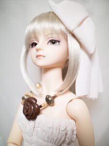 Rating: Safe Score: 0 Tags: 1girl bangs bare_shoulders blurry blurry_background closed_mouth depth_of_field doll dress lips long_hair necklace solo strapless strapless_dress suigintou upper_body white_dress white_hair User: admin