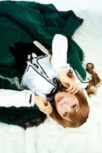 Rating: Safe Score: 0 Tags: 1girl black_ribbon brown_hair dress drill_hair frills green_dress lips lolita_fashion long_hair long_sleeves looking_at_viewer red_eyes ribbon solo suiseiseki twin_drills User: admin