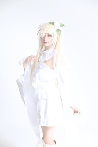 Rating: Safe Score: 0 Tags: 1girl bangs blonde_hair dress kirakishou lips long_hair solo striped white_dress User: admin