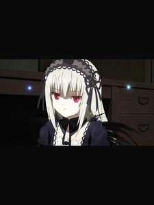 Rating: Safe Score: 0 Tags: 1girl bangs black_ribbon closed_mouth detached_collar dress eyebrows_visible_through_hair hairband image indoors letterboxed lolita_fashion long_hair looking_at_viewer red_eyes ribbon silver_hair solo suigintou User: admin