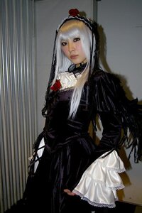 Rating: Safe Score: 0 Tags: 1girl black_dress dress flower frills gothic_lolita lips lolita_fashion long_hair long_sleeves looking_at_viewer rose solo standing suigintou User: admin