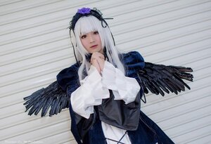 Rating: Safe Score: 0 Tags: 1girl bangs black_wings dress feathered_wings feathers flower gothic_lolita hairband lips lolita_fashion long_hair long_sleeves looking_at_viewer silver_hair solo suigintou wings User: admin