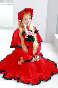 Rating: Safe Score: 0 Tags: 1girl blonde_hair blue_eyes bonnet capelet cup curtains dress lace long_hair long_sleeves looking_at_viewer red_capelet red_dress shinku sitting solo teacup User: admin