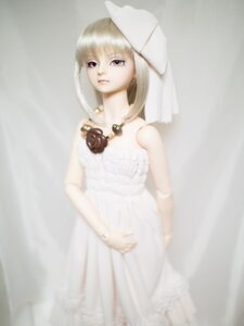 Rating: Safe Score: 0 Tags: 1girl bangs bare_shoulders blonde_hair blurry doll dress lips looking_at_viewer sleeveless sleeveless_dress solo standing striped suigintou veil white_dress User: admin
