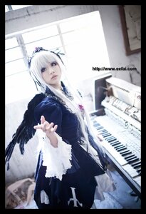 Rating: Safe Score: 0 Tags: 1girl 3d black_border blurry depth_of_field dress guitar instrument letterboxed pillarboxed silver_hair solo suigintou white_hair wings User: admin