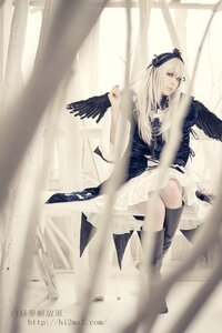Rating: Safe Score: 0 Tags: 1girl bird blonde_hair blue_eyes boots dress feathers knee_boots lips long_hair sitting solo suigintou User: admin