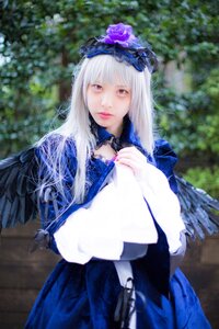 Rating: Safe Score: 0 Tags: 1girl bangs blue_dress blurry blurry_background capelet depth_of_field dress flower lips long_hair looking_at_viewer nail_polish solo suigintou User: admin