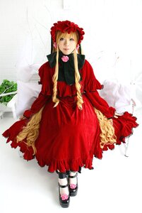 Rating: Safe Score: 0 Tags: 1girl black_footwear blonde_hair blue_eyes bonnet bow dress flower full_body long_hair long_sleeves looking_at_viewer red_dress rose shinku shoes sitting solo striped very_long_hair User: admin