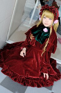 Rating: Safe Score: 0 Tags: 1girl auto_tagged bangs blonde_hair blue_eyes bonnet bow checkered checkered_floor dress flower long_hair long_sleeves looking_at_viewer red_dress rose shinku sitting solo tile_floor tiles User: admin
