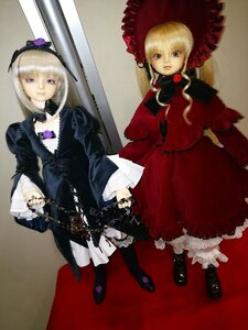 Rating: Safe Score: 0 Tags: 1girl black_footwear blonde_hair bonnet boots doll dress frills hat long_sleeves looking_at_viewer multiple_dolls standing tagme twins umbrella User: admin