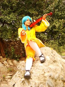 Rating: Safe Score: 0 Tags: 1girl blue_hair closed_eyes instrument kanaria long_hair playing_instrument sandals solo User: admin