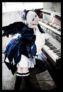 Rating: Safe Score: 0 Tags: 1girl black_border black_legwear dress frills hairband instrument letterboxed pillarboxed sheet_music silver_hair solo suigintou thighhighs white_hair wings User: admin