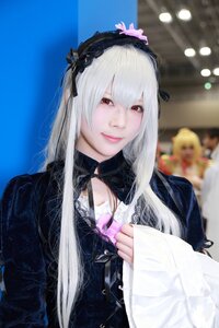 Rating: Safe Score: 0 Tags: 1girl blonde_hair blurry closed_mouth dress hairband long_hair long_sleeves looking_at_viewer red_eyes silver_hair smile solo solo_focus suigintou upper_body User: admin