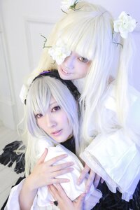 Rating: Safe Score: 0 Tags: 2girls bangs flower lips long_hair looking_at_viewer multiple_cosplay multiple_girls photo realistic red_eyes smile suigintou tagme white_flower white_hair User: admin