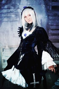 Rating: Safe Score: 0 Tags: 1girl 3d black_dress black_wings blurry blurry_background dress feathers flower frills gothic_lolita hairband lolita_fashion long_hair long_sleeves looking_at_viewer red_eyes solo standing suigintou white_hair wings User: admin
