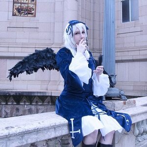 Rating: Safe Score: 0 Tags: 1girl boots dress long_sleeves ribbon solo standing suigintou white_hair wings User: admin