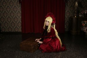 Rating: Safe Score: 0 Tags: 1girl bangs blonde_hair blue_eyes bonnet curtains dress flower indoors lolita_fashion long_hair long_sleeves looking_at_viewer red_dress rose shinku sitting solo User: admin