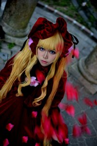 Rating: Safe Score: 0 Tags: 1girl bangs blonde_hair blue_eyes blurry blurry_background bonnet bow depth_of_field dress flower lips long_hair looking_at_viewer red_dress shinku solo twintails User: admin