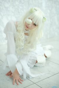 Rating: Safe Score: 0 Tags: 1girl artist_name bangs blonde_hair dress hair_ornament kirakishou lips long_hair long_sleeves looking_at_viewer sitting solo User: admin