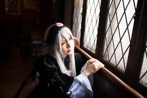 Rating: Safe Score: 0 Tags: 1girl flower gothic_lolita indoors lips long_hair long_sleeves looking_at_viewer solo suigintou window User: admin