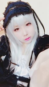 Rating: Safe Score: 0 Tags: 1girl closed_mouth gloves lips looking_at_viewer red_eyes simple_background solo suigintou upper_body white_hair User: admin