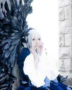 Rating: Safe Score: 0 Tags: 1girl belt bird black_feathers blurry depth_of_field feathered_wings feathers long_sleeves looking_at_viewer pants shirt sitting solo suigintou white_hair wings User: admin