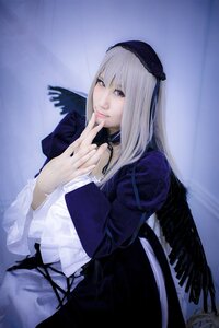 Rating: Safe Score: 0 Tags: 1girl 3d bangs black_wings closed_mouth dress feathered_wings feathers frills juliet_sleeves lips long_hair long_sleeves looking_at_viewer nail_polish puffy_sleeves silver_hair solo suigintou upper_body wings User: admin