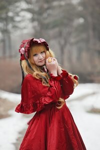 Rating: Safe Score: 0 Tags: 1girl bangs blonde_hair blurry blurry_background depth_of_field dress flower jewelry long_hair long_sleeves looking_at_viewer red_dress ring shinku solo standing User: admin