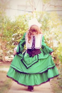 Rating: Safe Score: 0 Tags: 1girl blonde_hair brown_hair closed_eyes curtsey dress frills full_body green_dress long_hair long_sleeves skirt_hold solo standing suiseiseki User: admin