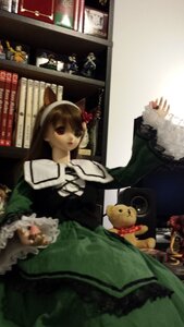 Rating: Safe Score: 0 Tags: 1girl brown_hair doll dress flower green_dress indoors long_hair long_sleeves photo solo stuffed_animal suiseiseki teddy_bear User: admin