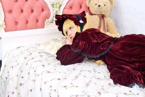 Rating: Safe Score: 0 Tags: 1girl bed blonde_hair blue_eyes bonnet dress long_sleeves looking_at_viewer lying red_dress shinku solo stuffed_animal teddy_bear User: admin