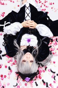 Rating: Safe Score: 0 Tags: 1girl black_dress dress flower gothic_lolita hairband lips lolita_fashion long_hair long_sleeves looking_at_viewer petals solo suigintou User: admin