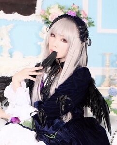Rating: Safe Score: 0 Tags: 1girl black_dress blurry blurry_background blurry_foreground building depth_of_field dress flower hairband long_hair long_sleeves photo solo suigintou User: admin