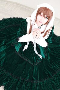 Rating: Safe Score: 0 Tags: 1girl brown_hair dress frills green_dress green_eyes heterochromia long_sleeves looking_at_viewer own_hands_together red_eyes sitting solo souseiseki suiseiseki User: admin