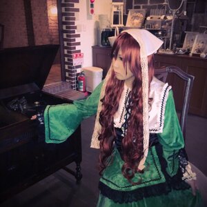 Rating: Safe Score: 0 Tags: 1girl brown_hair dress green_dress indoors long_hair long_sleeves sitting solo suiseiseki veil very_long_hair User: admin