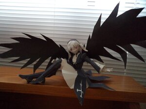 Rating: Safe Score: 0 Tags: 1girl armor doll red_eyes sitting solo suigintou thighhighs white_hair wings User: admin