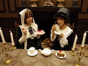Rating: Safe Score: 0 Tags: 2boys brown_hair cake candle cup food fruit hat multiple_boys multiple_cosplay pastry plate sitting table tagme tea teacup watch User: admin