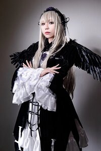 Rating: Safe Score: 0 Tags: 1girl black_wings dress feathers frilled_sleeves frills gothic_lolita hairband lips long_hair long_sleeves looking_at_viewer ribbon silver_hair solo standing suigintou wide_sleeves wings User: admin