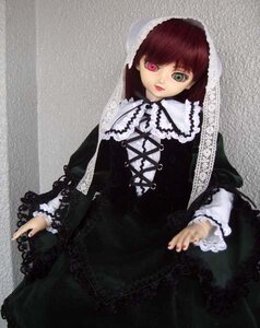 Rating: Safe Score: 0 Tags: 1girl bangs black_dress brown_hair doll dress frills gothic_lolita green_eyes heterochromia lolita_fashion long_hair long_sleeves looking_at_viewer nail_polish red_eyes solo suiseiseki User: admin