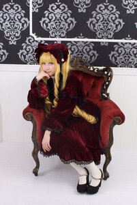 Rating: Safe Score: 0 Tags: 1girl blonde_hair blue_eyes bonnet chair dress drill_hair lolita_fashion long_hair long_sleeves looking_at_viewer red_dress shinku sitting solo User: admin