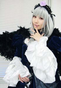 Rating: Safe Score: 0 Tags: 1girl closed_mouth dress flower frills gothic_lolita hairband lolita_fashion long_sleeves looking_at_viewer red_eyes rose silver_hair solo suigintou User: admin