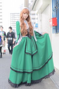 Rating: Safe Score: 0 Tags: 1girl blonde_hair blurry blurry_background blurry_foreground day depth_of_field dress green_dress long_hair long_sleeves looking_at_viewer multiple_girls outdoors skirt_hold solo solo_focus standing suiseiseki User: admin