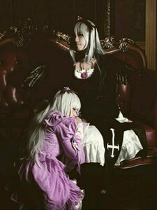 Rating: Safe Score: 0 Tags: 1girl dress frills long_hair long_sleeves multiple_cosplay silver_hair sitting suigintou tagme very_long_hair User: admin