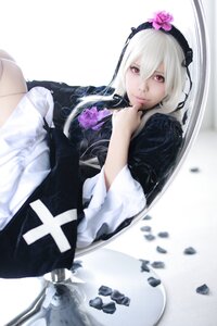 Rating: Safe Score: 0 Tags: 1girl 3d blurry closed_mouth depth_of_field flower long_hair long_sleeves looking_at_viewer red_eyes sitting solo suigintou User: admin