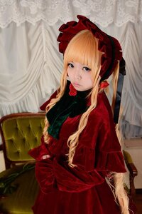 Rating: Safe Score: 0 Tags: 1girl bangs blonde_hair blue_eyes blunt_bangs bonnet curtains dress flower long_hair long_sleeves looking_at_viewer red_dress shinku solo User: admin