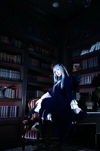 Rating: Safe Score: 0 Tags: 1girl black_dress blurry book book_stack bookshelf closed_eyes dress indoors library long_hair sitting solo suigintou voile User: admin