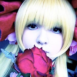 Rating: Safe Score: 0 Tags: 1girl bangs blonde_hair blue_skin blurry blurry_foreground depth_of_field flower shinku solo User: admin